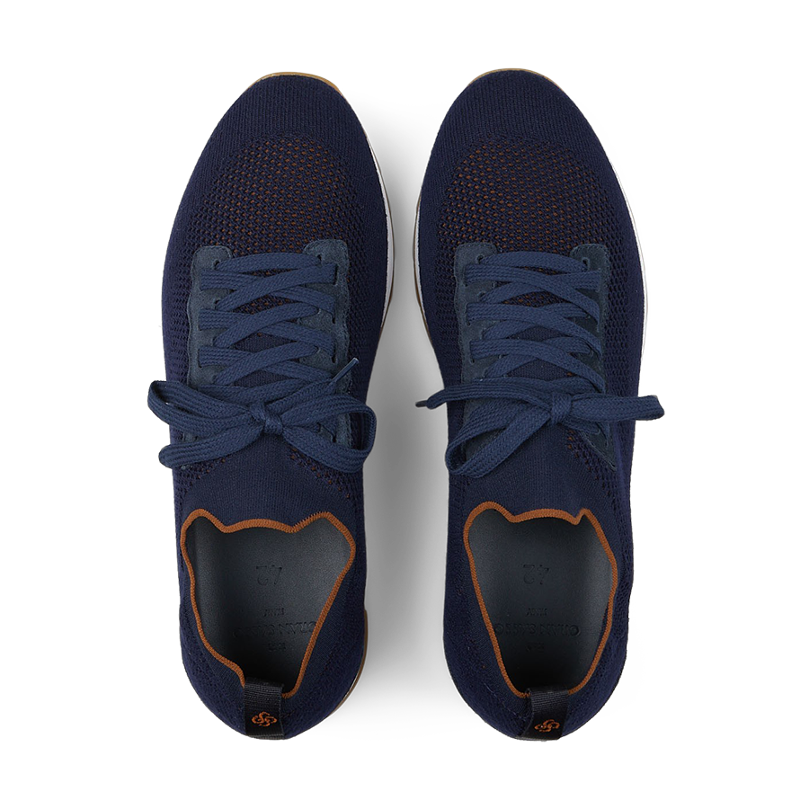 A pair of Gran Sasso navy blue technical knitted nylon trainers with orange accents, viewed from above.