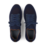 A pair of Gran Sasso navy blue technical knitted nylon trainers with orange accents, viewed from above.