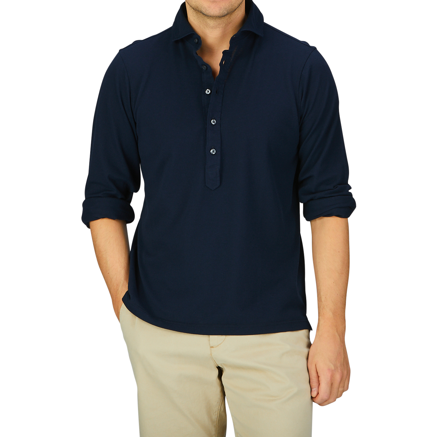 Man wearing a navy Cotton Jersey Popover Gran Sasso shirt and beige trousers.