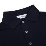A navy Merino Wool one-piece collar polo shirt, made by Gran Sasso.