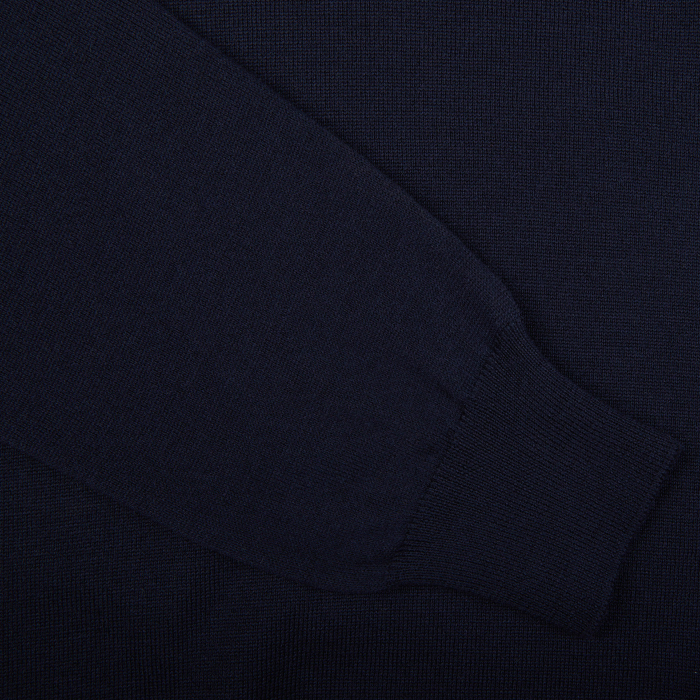 A close up of a Gran Sasso Navy Merino Wool One-Piece Collar Polo Shirt.