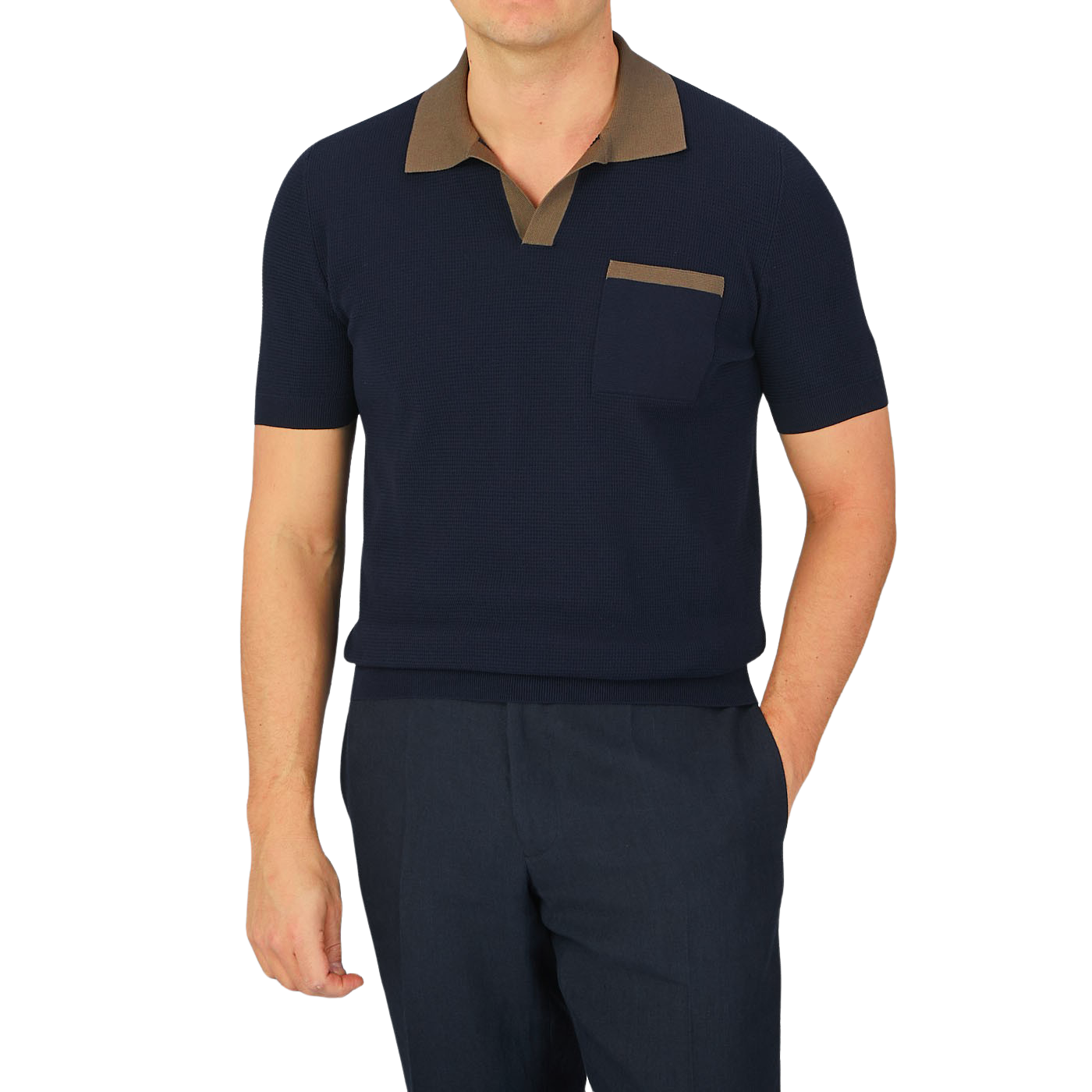 A man wearing a Navy Fresh Cotton Contrast Collar Polo Shirt by Gran Sasso and brown pants made of cotton.