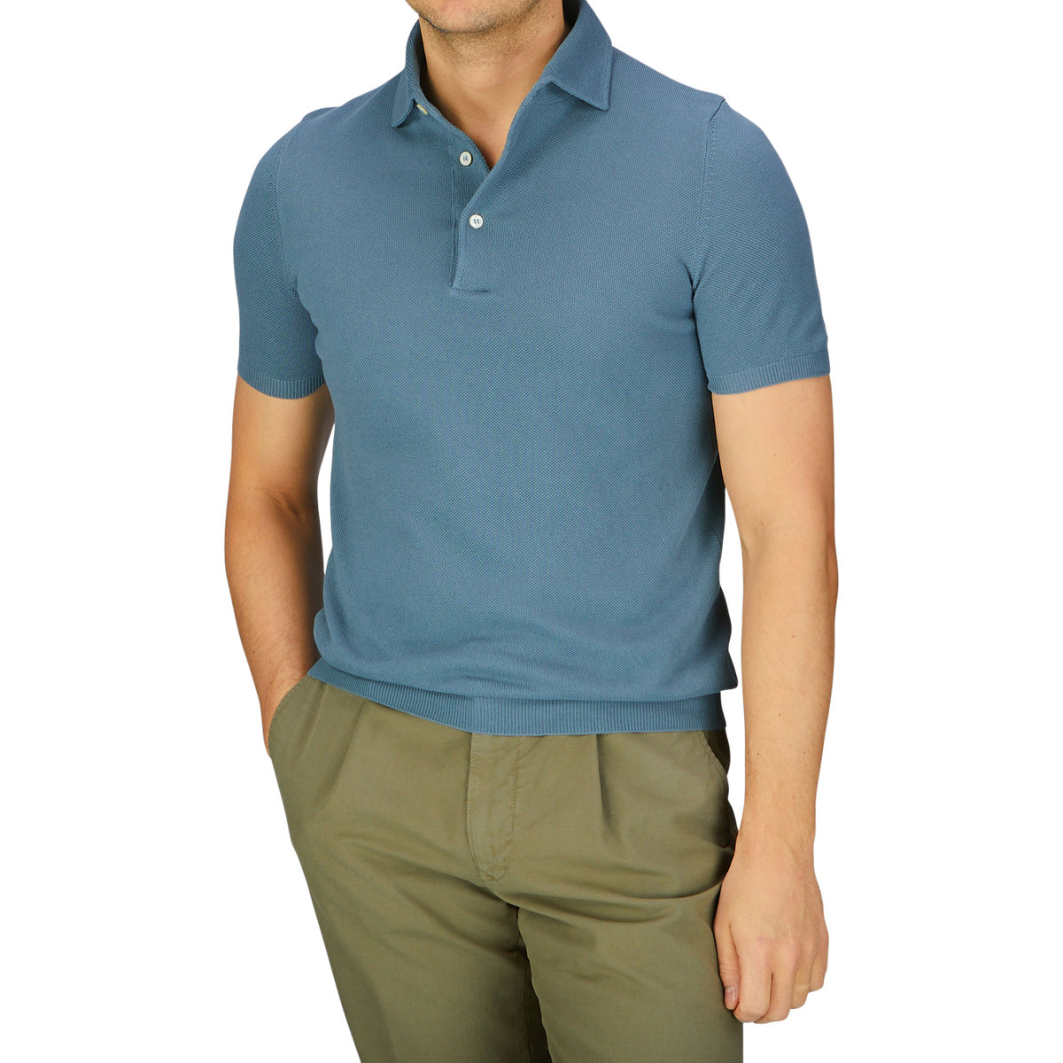 Man wearing a Turquoise Fresh Cotton Mesh Gran Sasso polo shirt and olive green trousers.