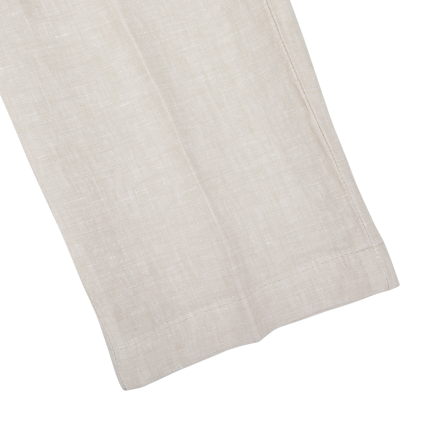 Close-up of a Hiltl light beige washed linen regular fit chinos with a subtle texture and visible weave, laid flat on a white background.