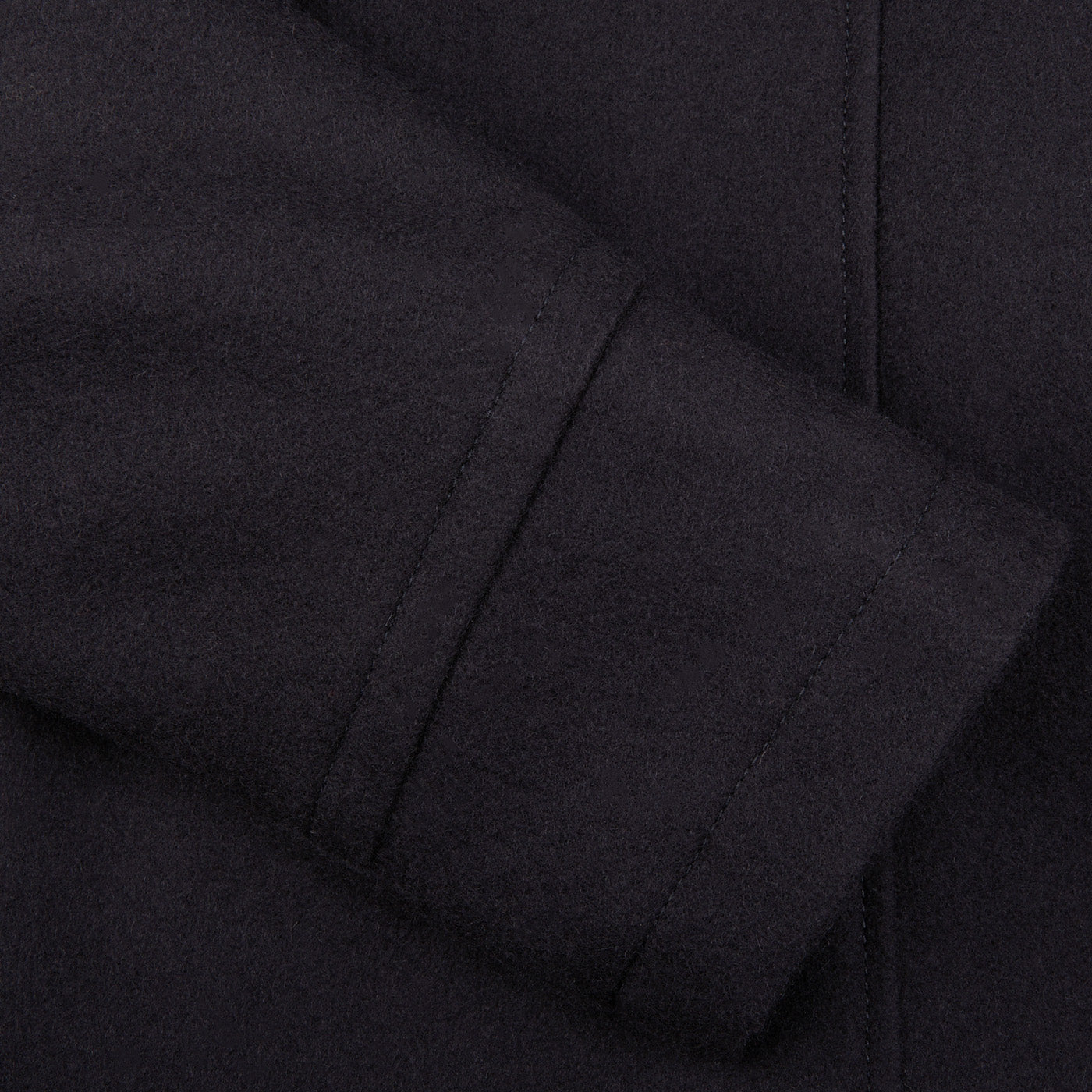 A close up of a Navy Blue Heavy Wool Casentino Peacoat by Manifattura Ceccarelli.