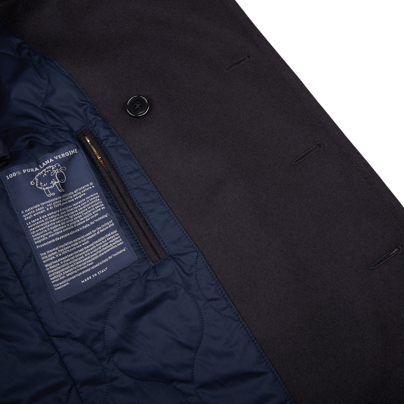 The back of a Navy Blue Heavy Wool Casentino Peacoat with a Manifattura Ceccarelli label on it.