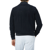 The back view of a man wearing a Manto Navy Blue Perforated Suede Leather Blouson.