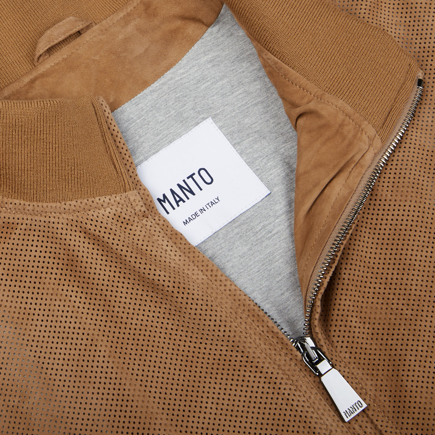 A close up of a Manto Tobacco Brown Perforated Suede Leather Blouson jacket.