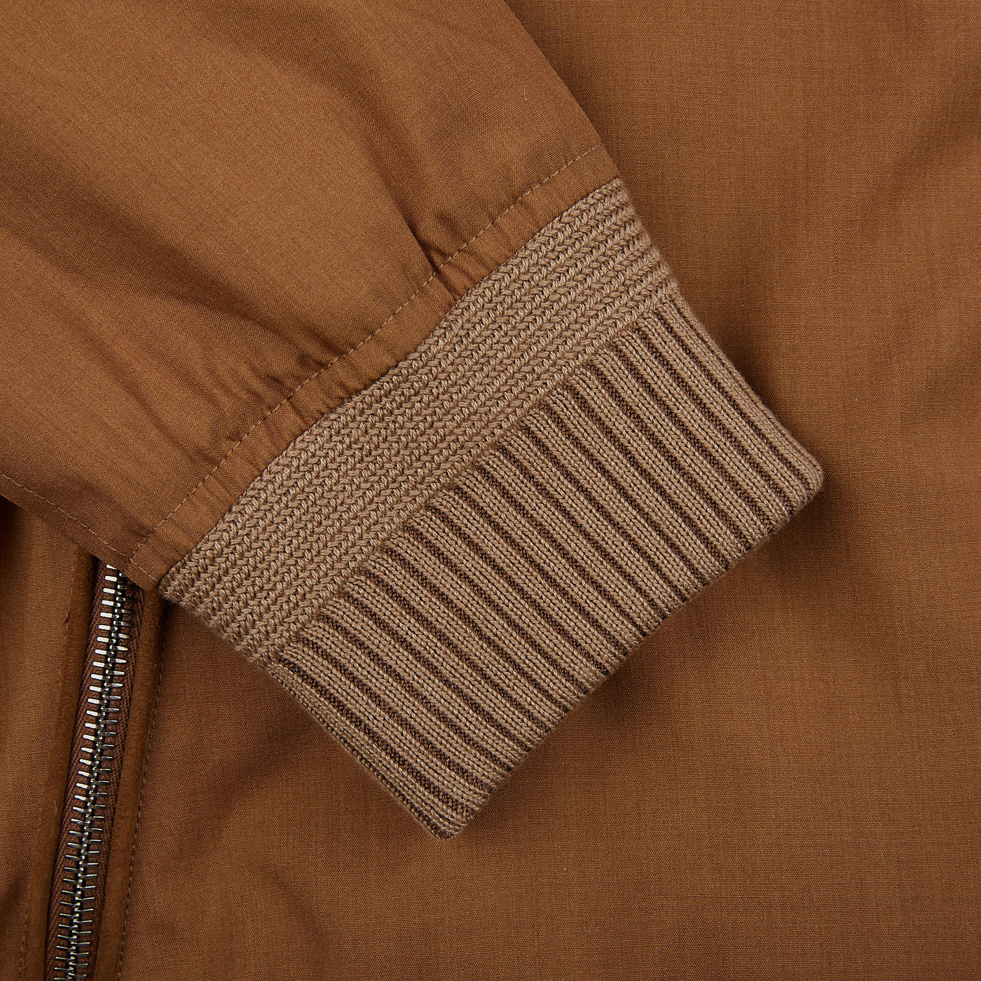A close up of a Tobacco Reversible Loro Piana Wool Silk Blouson brown bomber jacket by Manto.