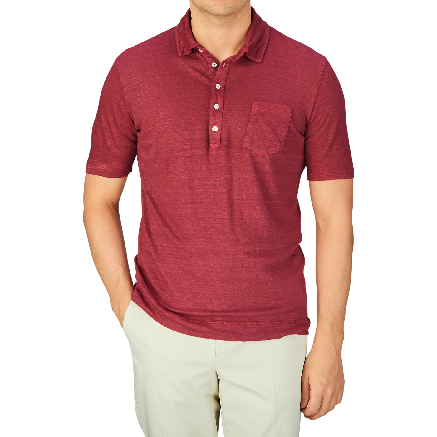 Man wearing a Massimo Alba Raspberry Red Linen Polo Shirt and beige pants.