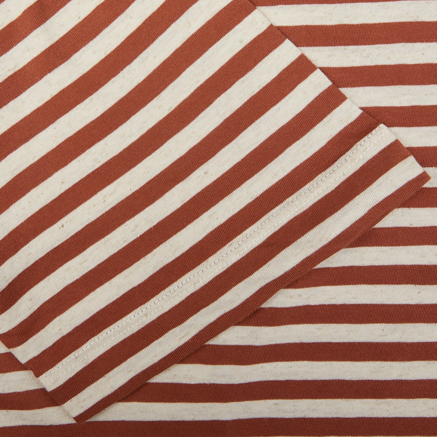Brown and white striped cotton-linen blend fabric with folded corner. 
Product Name: Rust Brown Striped Cotton Linen T-Shirt
Brand Name: Massimo Alba
