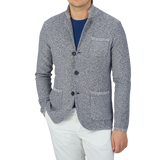 A man wearing a Maurizio Baldassari Blue Melange Cotton Mouline Knitted Jacket.