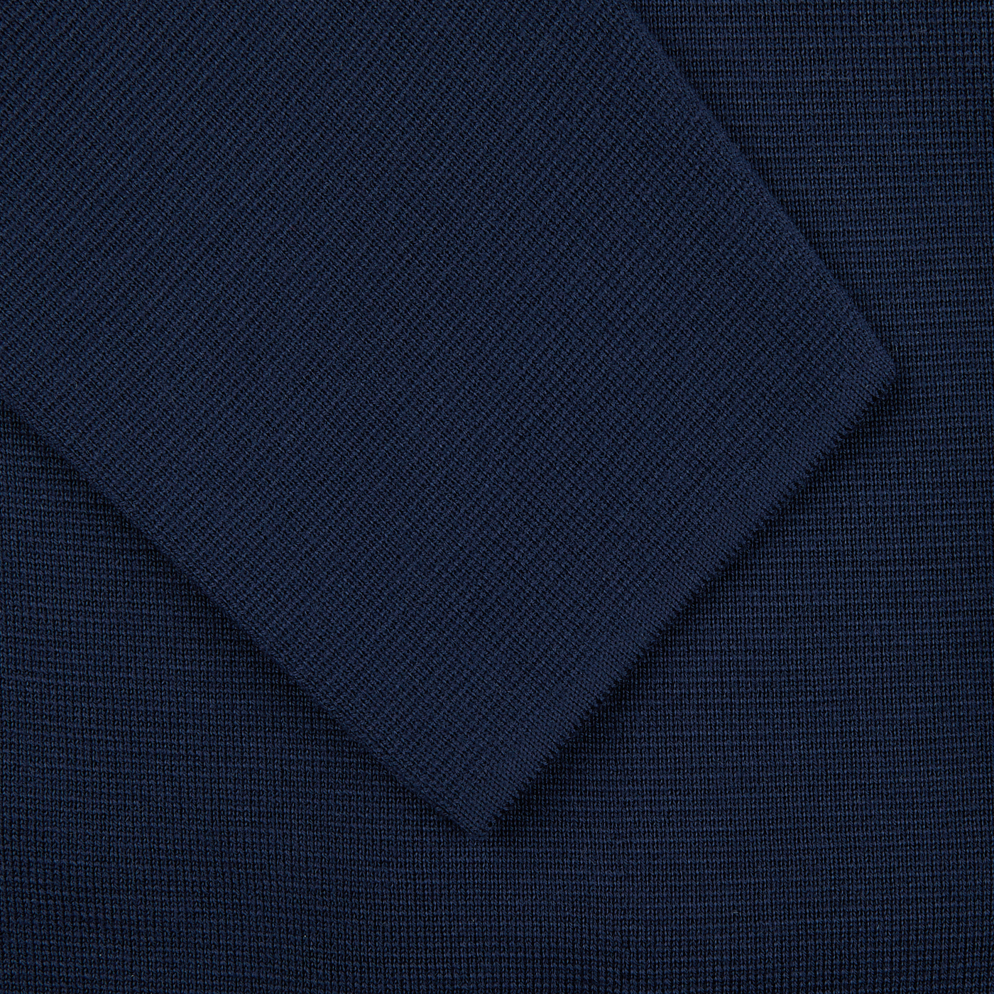A close up of a Maurizio Baldassari Navy Blue Merino Wool Milano Stitch Swacket.