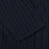 A close up of a Maurizio Baldassari Navy Blue Organic Cotton Rib Stitched Swacket.
