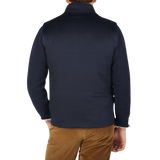 The Maurizio Baldassari Navy Water Repellent Pure Cashmere Gilet on a man's back.