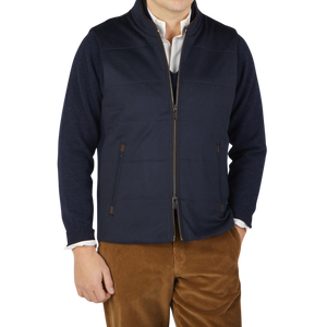 Maurizio Baldassari wearing a Navy Water Repellent Pure Cashmere Gilet and brown pants.