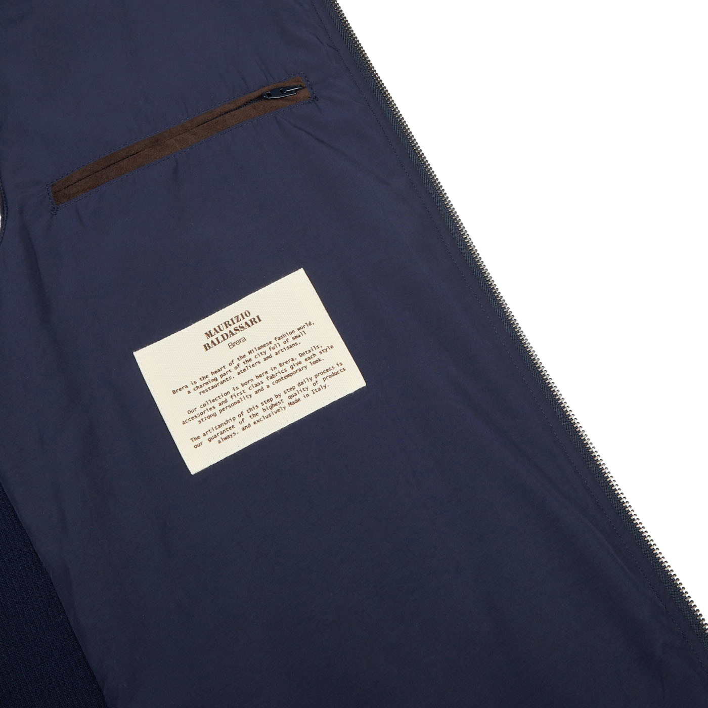 A Navy Water Repellent Pure Cashmere Gilet from Maurizio Baldassari with a label on it.
