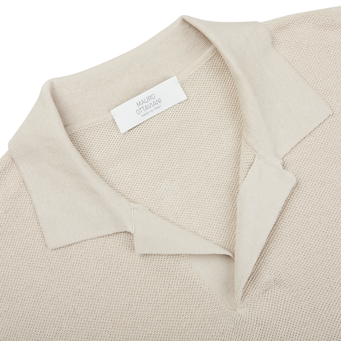 A close up of a Cream Beige Cotton Silk Mauro Ottaviani polo shirt.