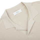 A close up of a Cream Beige Cotton Silk Mauro Ottaviani polo shirt.
