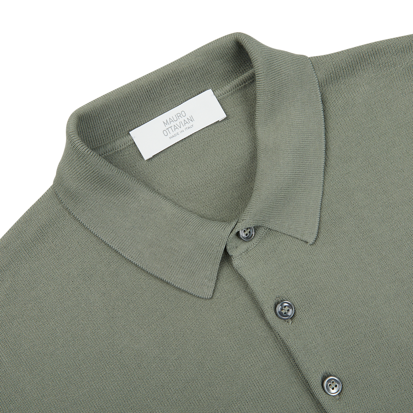 A close up of a khaki green Supima cotton LS polo shirt designed by Mauro Ottaviani.