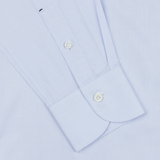Close-up of a Mazzarelli Light Blue Slim Cutaway Herringbone Shirt with detailed view of the collar, buttons, and textured fabric.