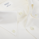 Close-up of a white cotton twill Mazzarelli Off White Cotton Twill BD Slim Shirt showing the collar detail and buttons with a label indicating "Made in Italy.