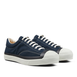 A pair of new Moonstar navy blue nylon gym court sneakers with white laces and vulcanized soles.