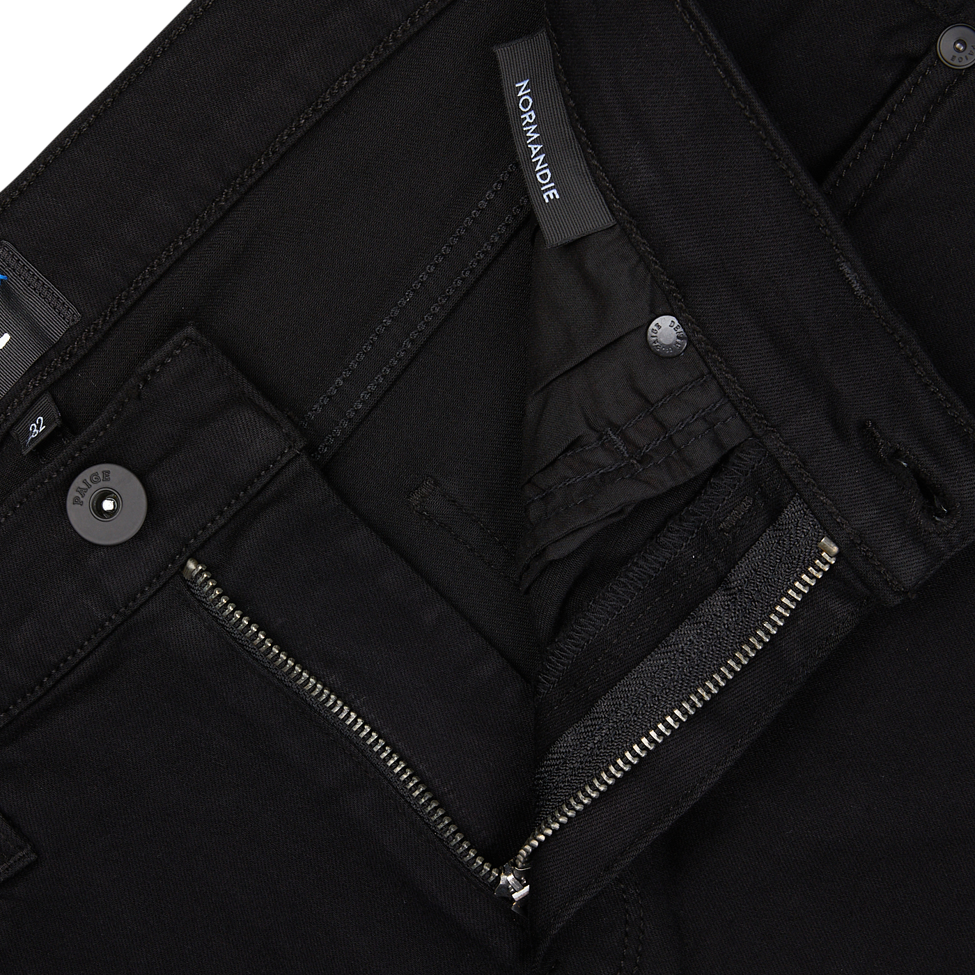 Black jacket with zipper and buttons, featuring a visible Paige jeans brand label.