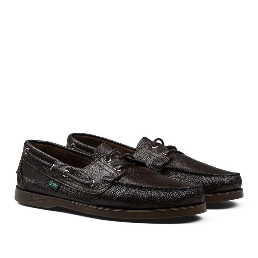 A pair of men's Dark Brown Grained Leather Barth Moccasins boat shoes with laces and a white sole by Paraboot.