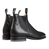 Pair of Black Yearling Leather Blaxland G Boots by R.M. Williams with pull tabs, designed for comfort.