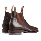 A pair of R.M. Williams Chestnut Brown Yearling Leather Blaxland G Boots with elastic side panels, designed for maximum comfort.
