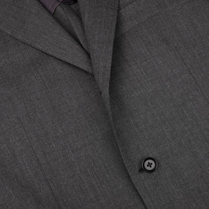 A close up image of a Ring Jacket Grey High Twist Wool Suit made with lightweight wool fresco fabric.