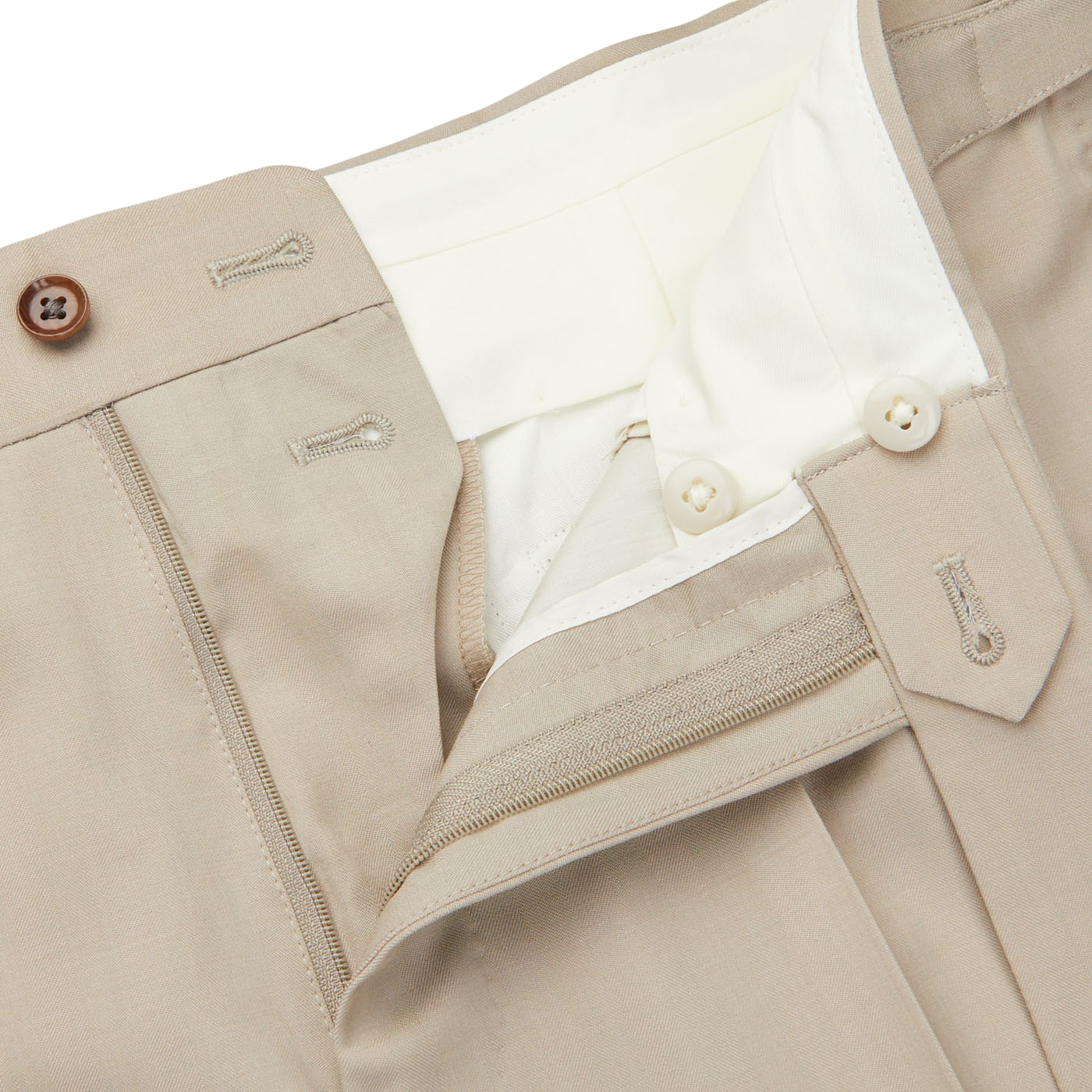 A pair of Light Beige Herringbone Wool Suit trousers by Ring Jacket with a button on the pocket.