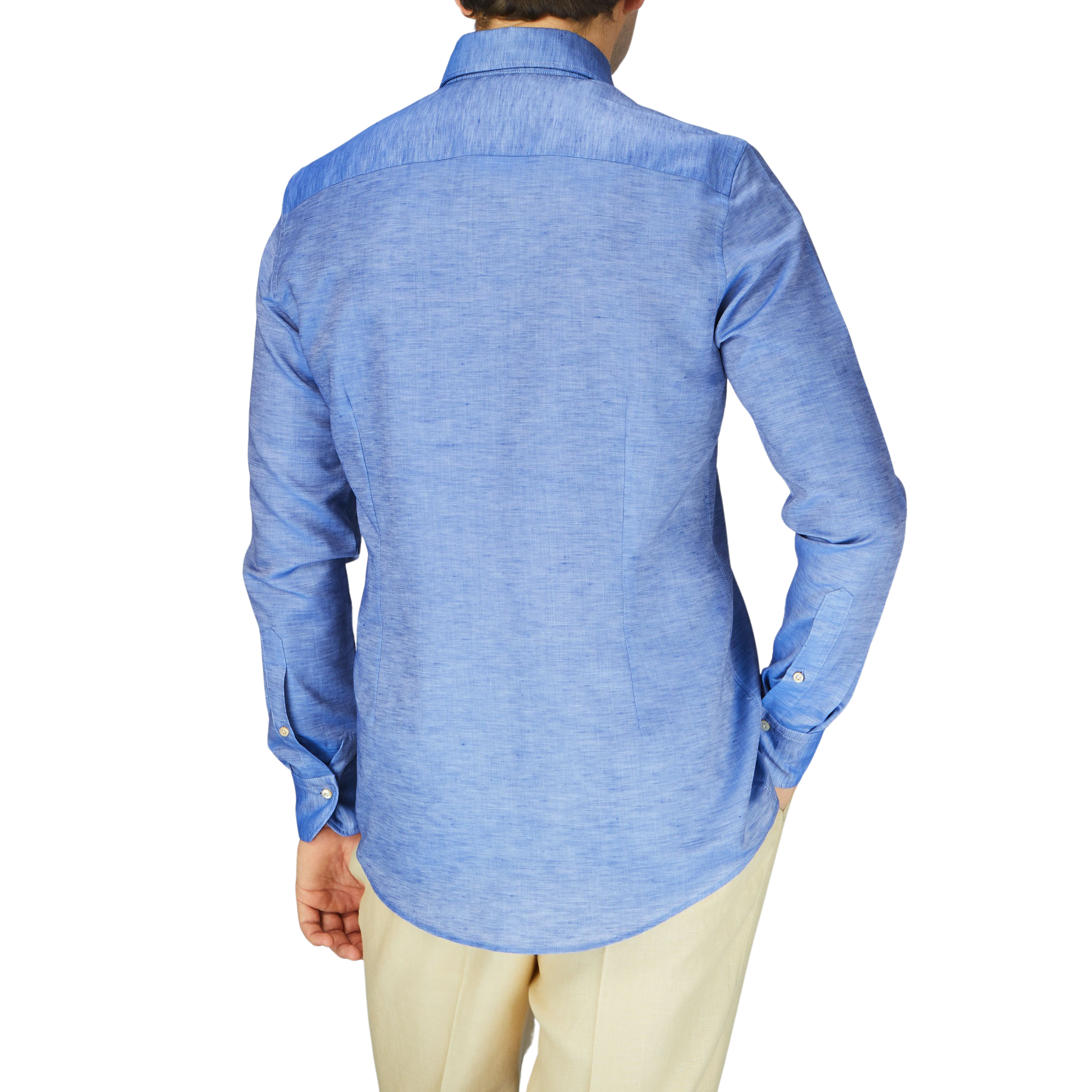 The man is wearing a casual Blue Melange Cotton Linen Slimline shirt from Stenströms, showcasing a slim fit.