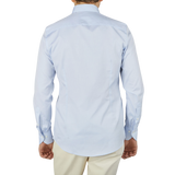 The back view of a man wearing a Light Blue Cotton Oxford BD Fitted Body Stenströms shirt.