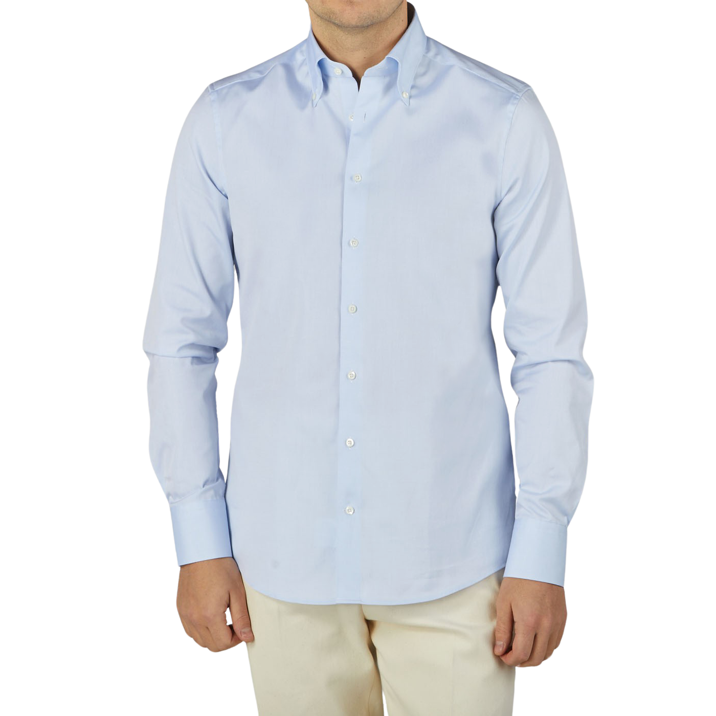 A man wearing a Stenströms Light Blue Cotton Oxford BD Fitted Body Shirt and tan pants.