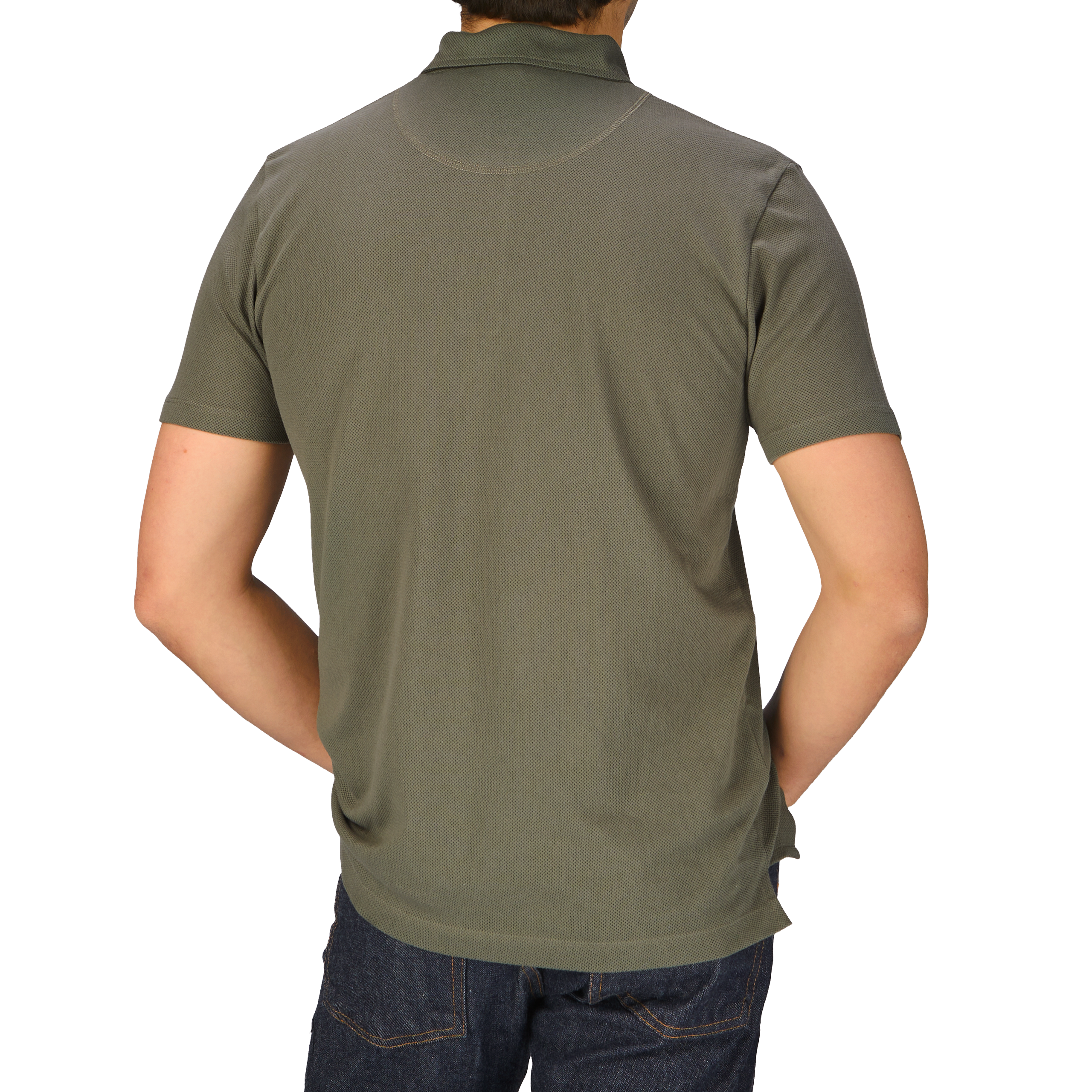 The man is wearing a Khaki Green Cotton Riviera Polo Shirt by Sunspel, resembling James Bond's iconic style.