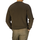 A man in a Sunspel Khaki Green Cotton Waffle Stitch Crew Neck sweater.