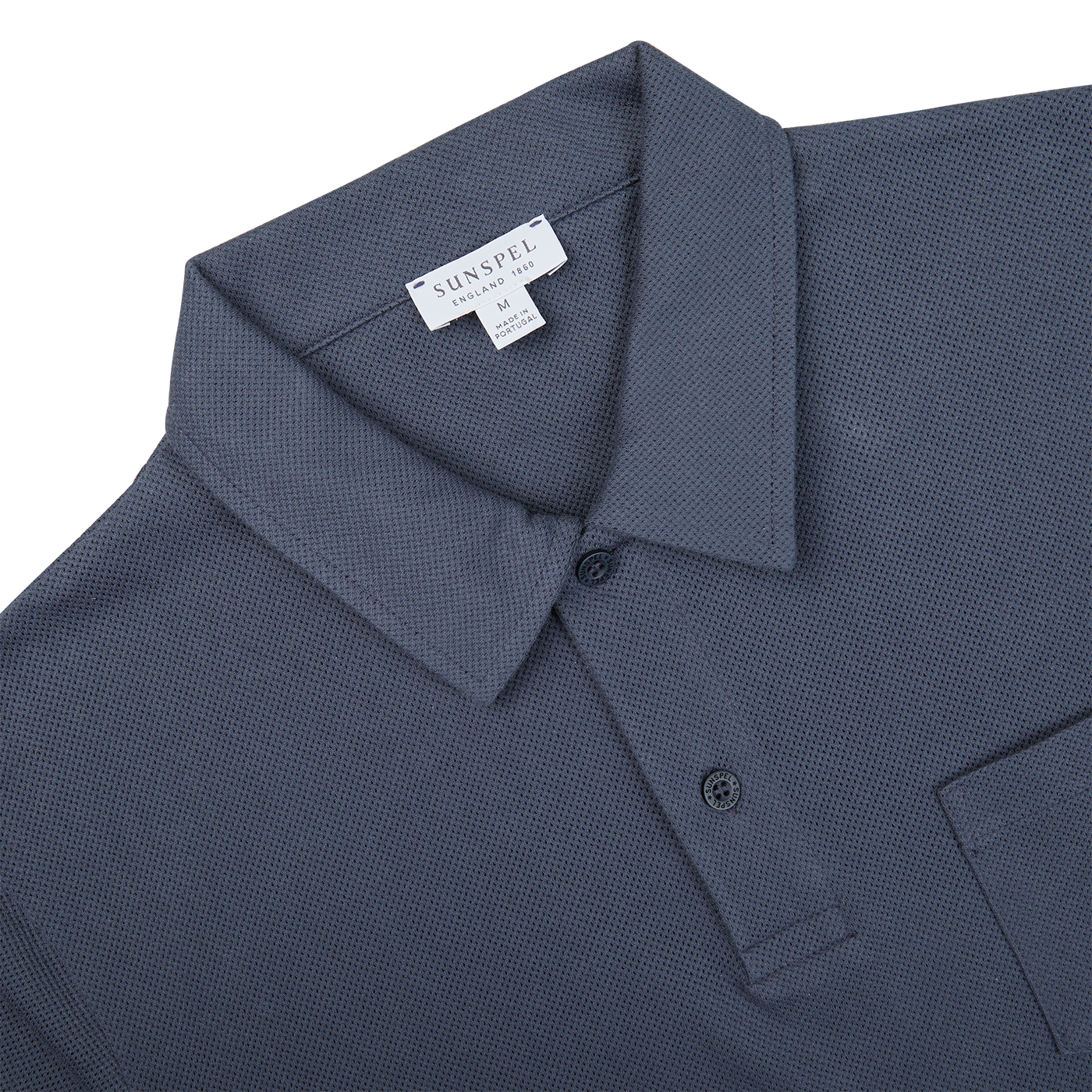 The Sunspel Slate Blue Cotton Riviera Polo Shirt inspired by James Bond in navy for men.