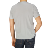 The back view of a man in a Sunspel Smoke Grey Classic Cotton T-Shirt.
