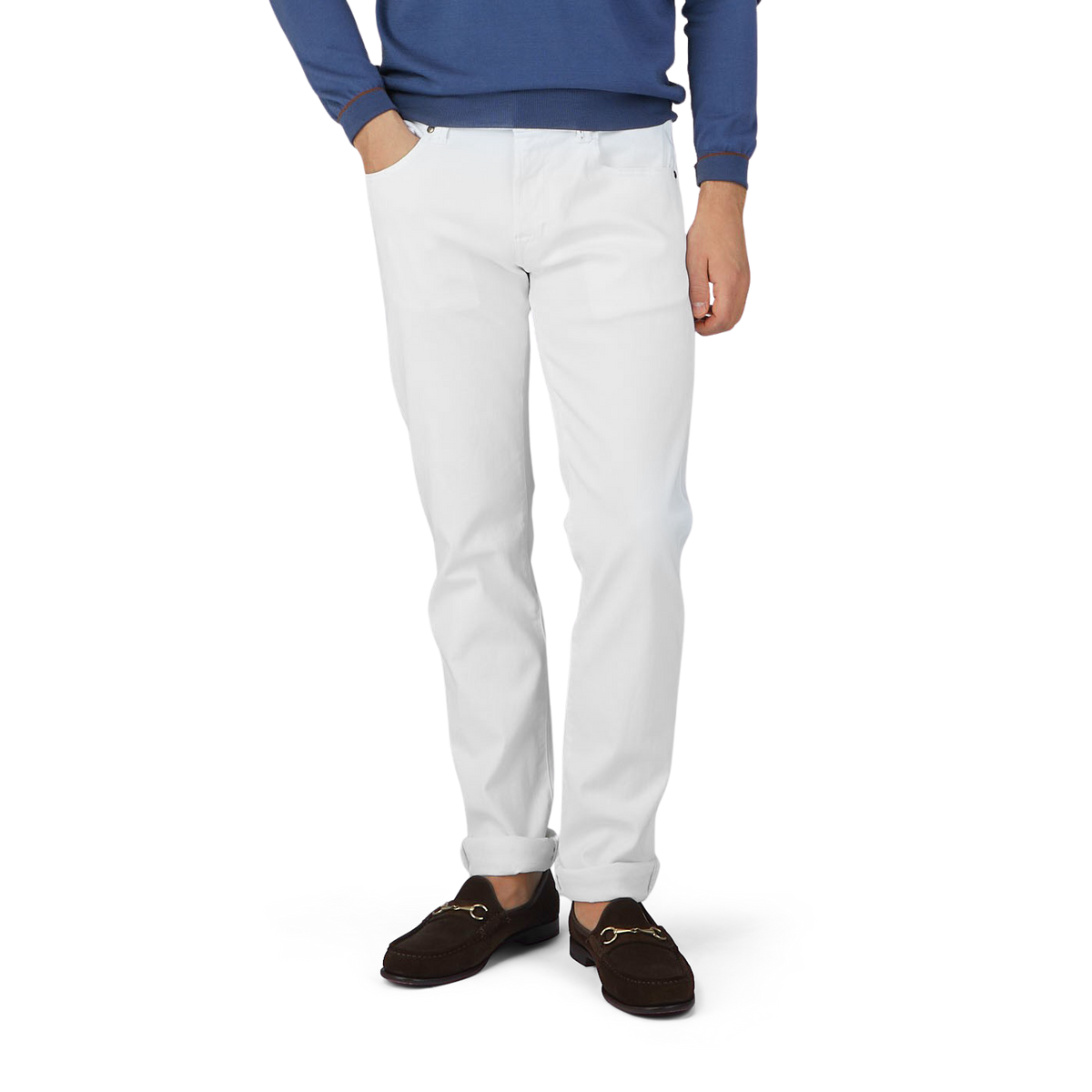A man in Tramarossa's White Super Stretch Michelangelo Jeans and a blue sweater.