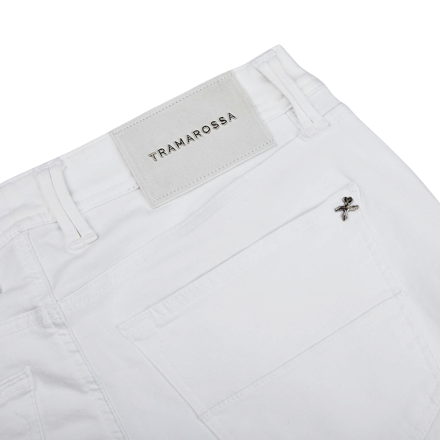 Tramarossa's White Super Stretch Michelangelo Jeans with a logo on them.