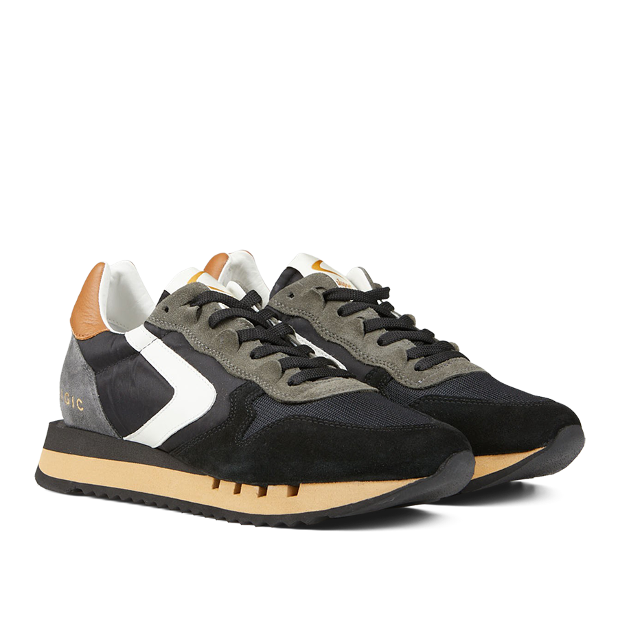 A pair of Black Leather Nylon Run30 Magic sneakers by Valsport with white accents and brown soles.