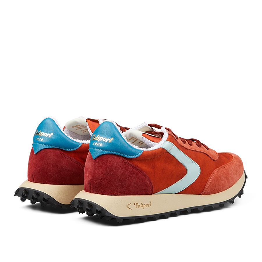 A pair of retro-style Valsport Bright Orange Nylon Suede Heritage Sneakers with red suede and blue accents, showcasing Italian craftsmanship.