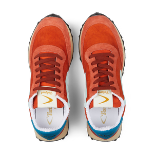 A pair of red and blue Valsport Bright Orange Nylon Suede Heritage sneakers viewed from above.