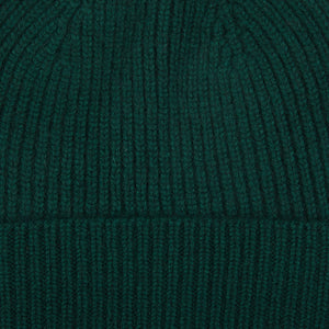 A warm Bottle Green Cashmere Fine Ribbed Beanie by William Lockie on a white background.