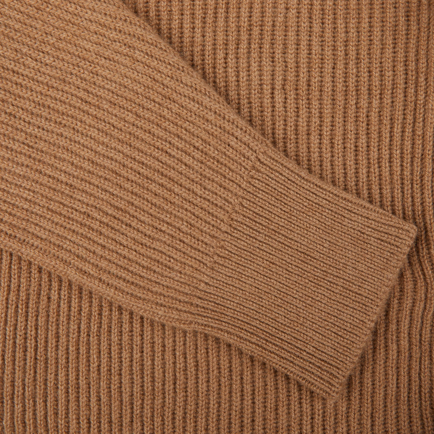 A close up image of a William Lockie Brown Camel Hair Shawl Collar Cardigan in camel brown.