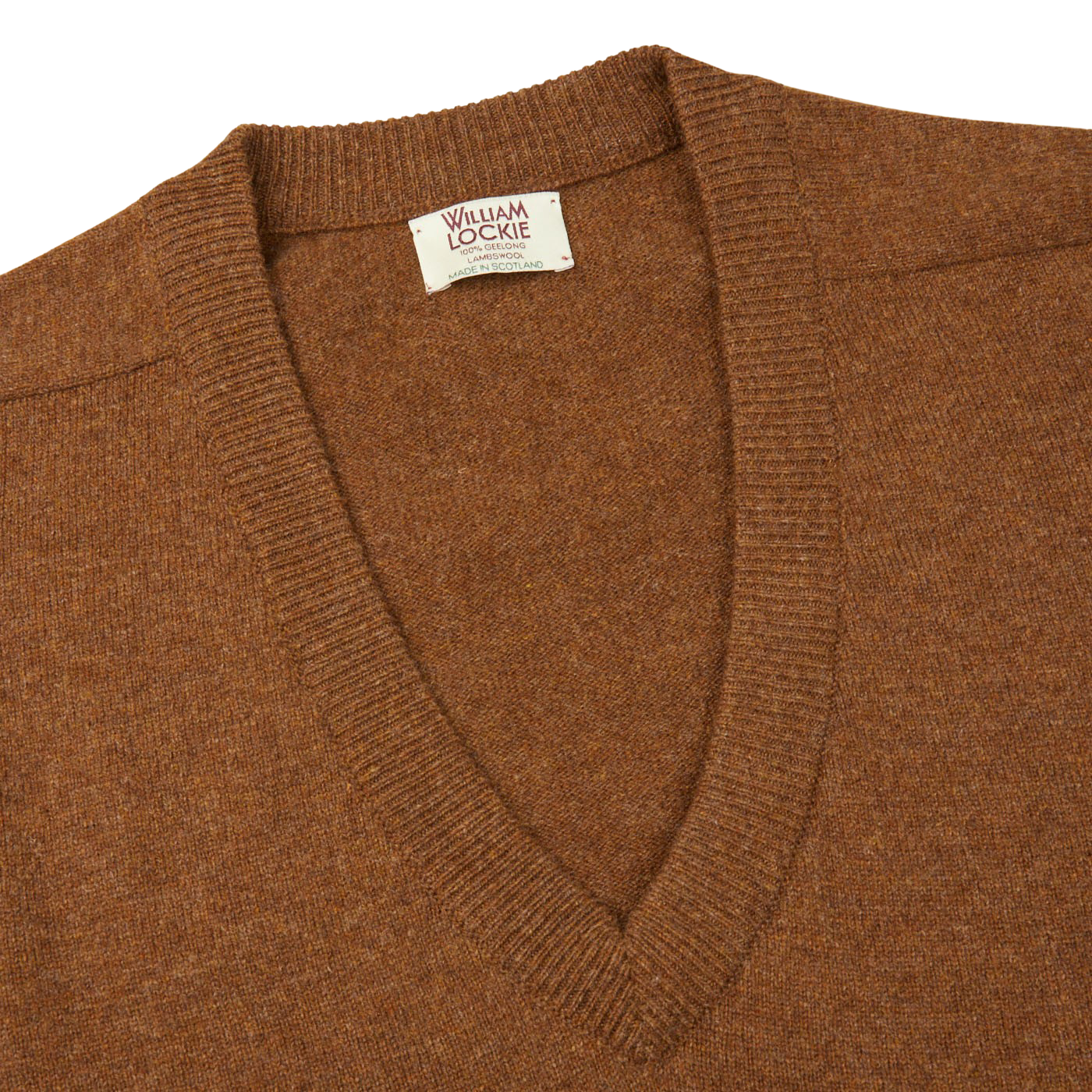 A William Lockie Kestrel Brown Deep V-Neck Lambswool Sweater with a label on it.