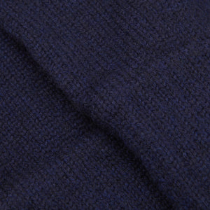 A close up of a William Lockie Navy Blue Pure Cashmere Gloves.