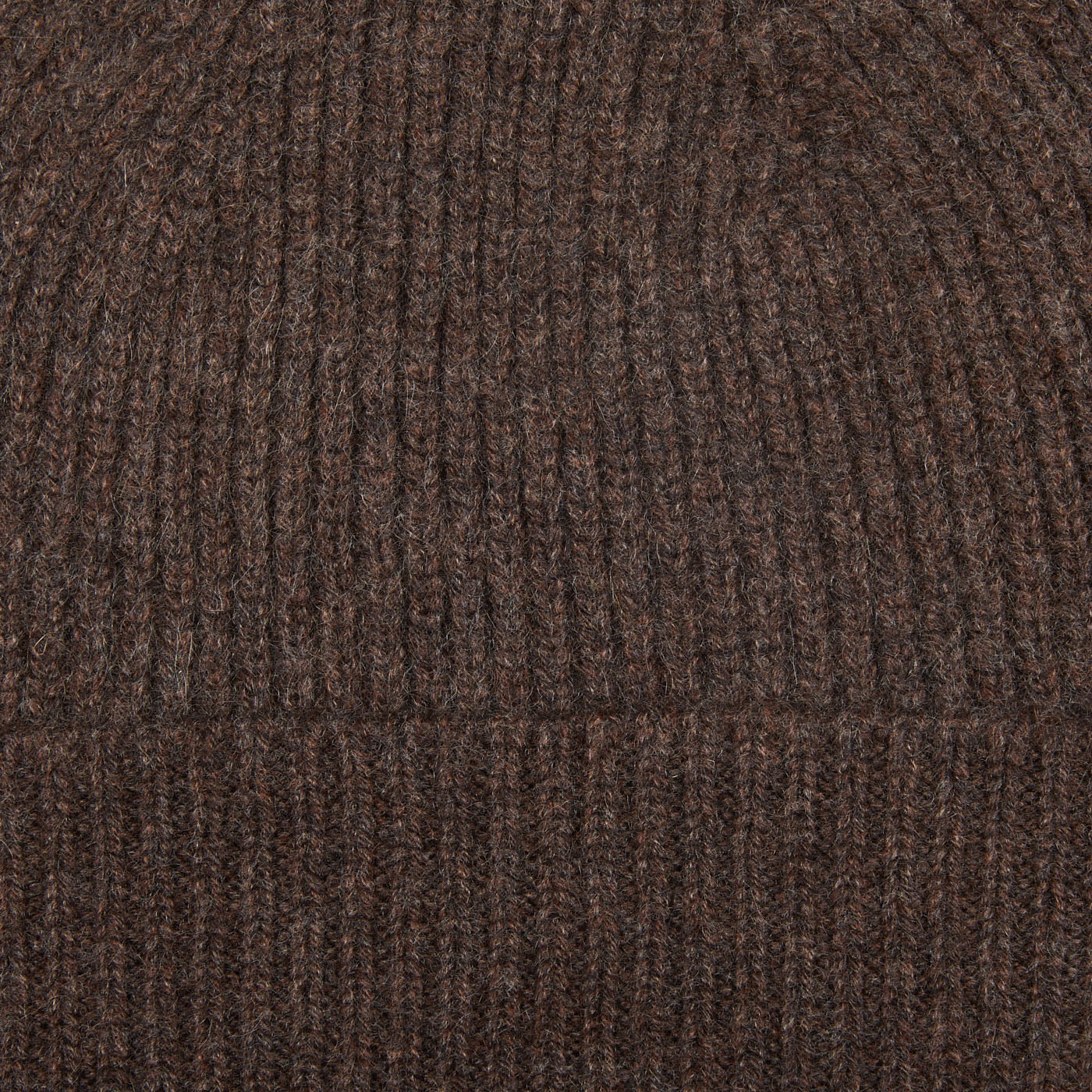 A close up of a William Lockie Porcupine Brown Cashmere Fine Ribbed Beanie.